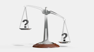 justice scales with question marks