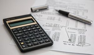 calculator over a financial document