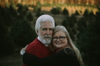 a senior couple hugging