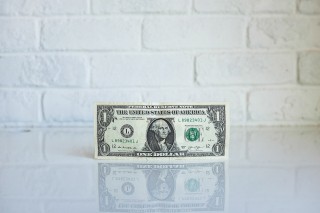 dollar bill on a counter