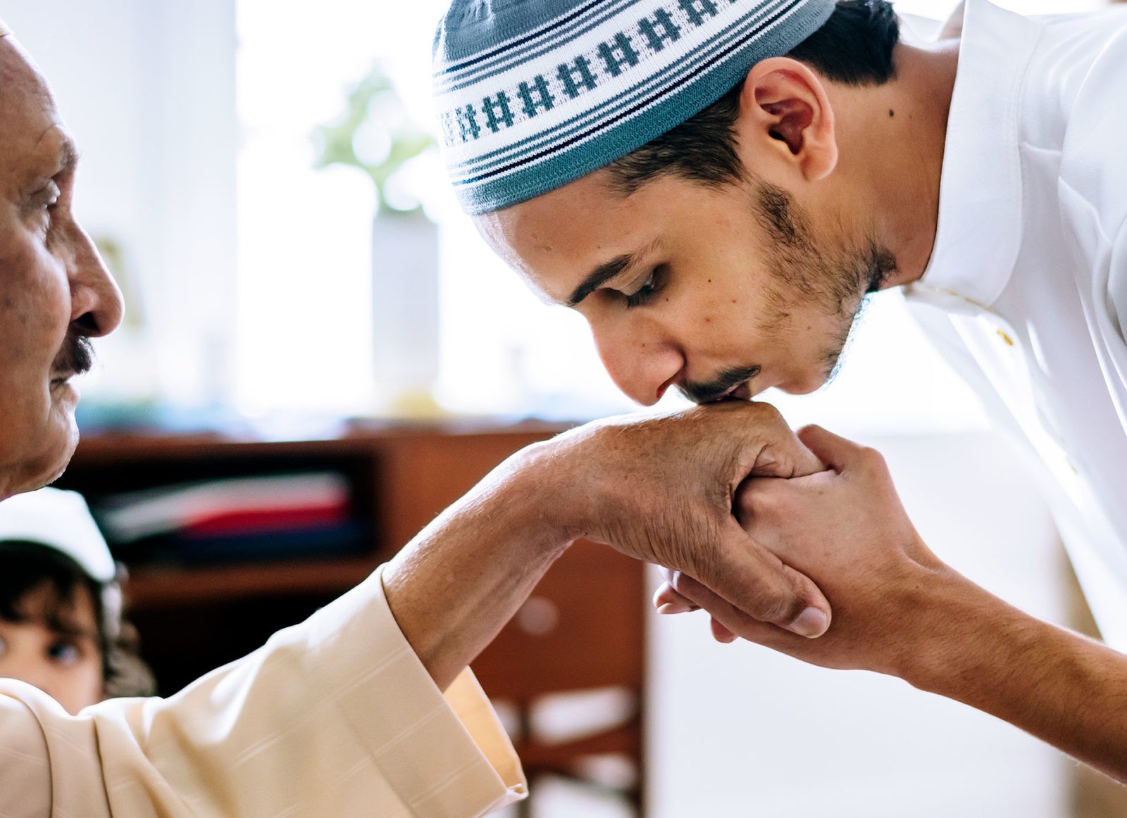 Son Kissing Father's Hand