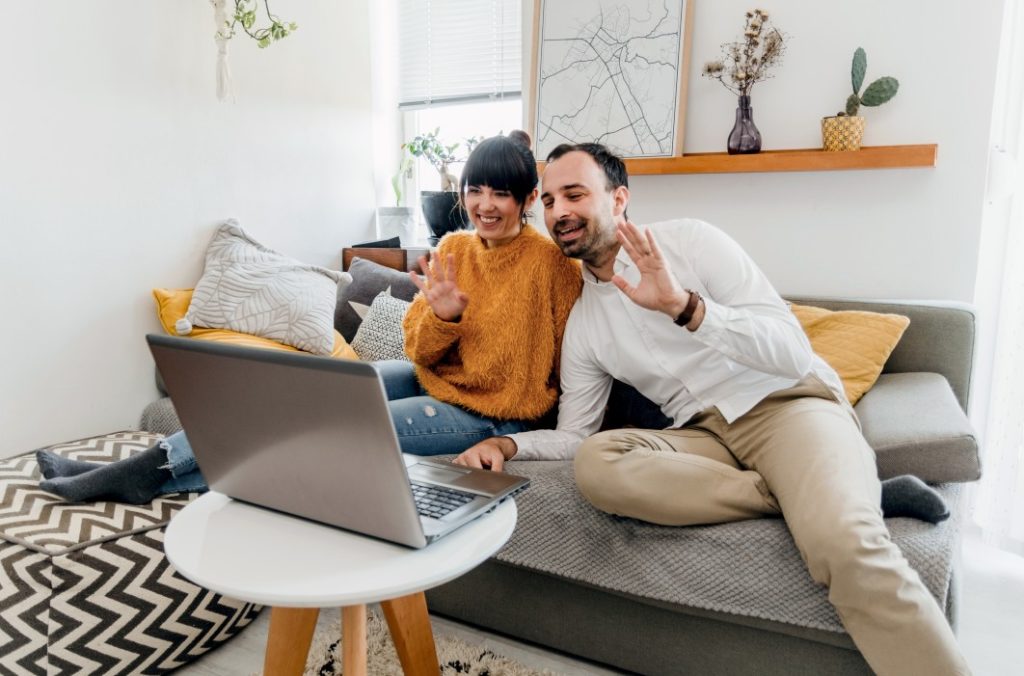 couple doing a video call on laptop