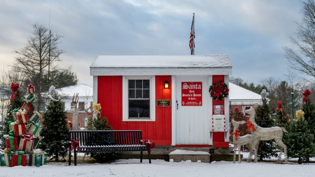 a photo of santa's workshop with trees