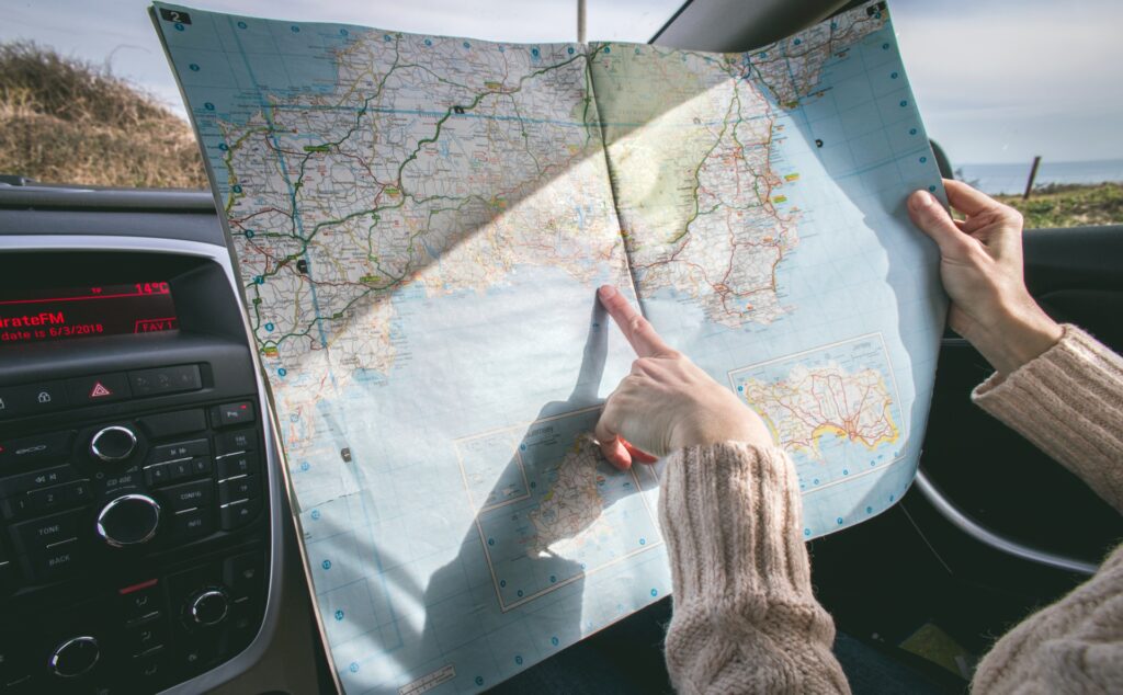 woman pointing to a map