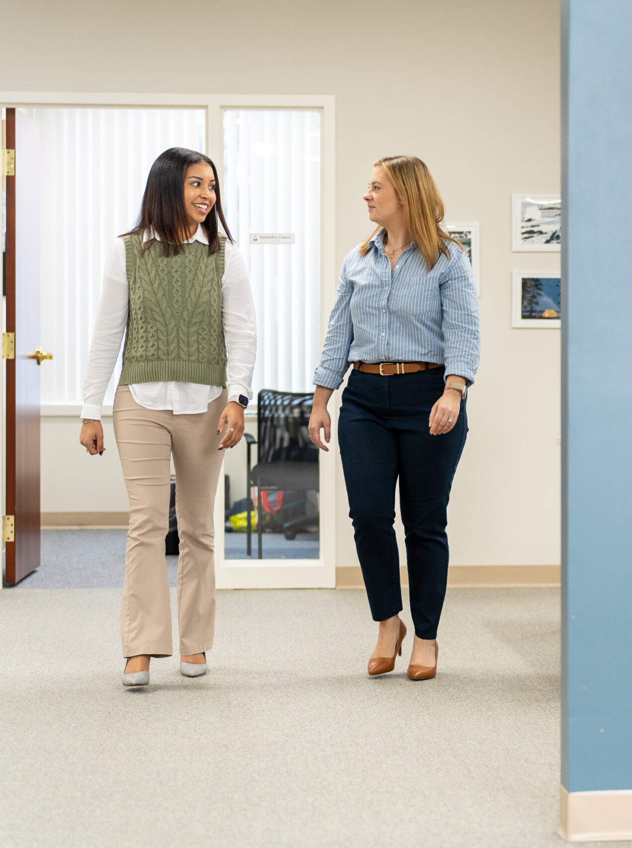 FEPLG staff walking in office